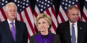 Hillary Clinton concedes the presidential election supported by her husband,former president Bill Clinton and her running mate,Tim Kaine,in 2016.