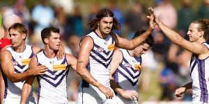 Luke Jackson and Nat Fyfe of the Dockers (right) celebrate during the 2024 AFL Round 12 match between the Melbourne Demons and the Fremantle Dockers at TIO Traeger Park on June 02,2024 in Alice Springs,Australia.