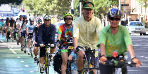 Cyclists take to the green cycle paths on College Street in Sydney's CBD to defend their use and practicality