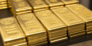 One kilogram gold bars stacked at the Perth Mint.