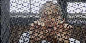 Journalist Peter Greste in the dock of an Egyptian courtroom in 2014.