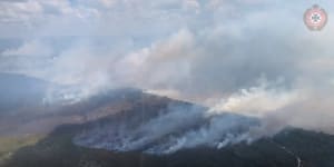 Firefighters hopeful of saving Fraser Island resort,unique rainforests