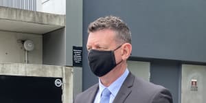 Detective Bryan Anthony Swift leaves Brisbane Magistrates Court on Tuesday.