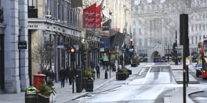 London's Regent Street in uncharacteristically quiet after shops were forced to close under Tier 4 restrictions.