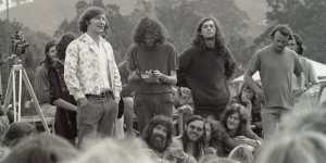 Aquarius Festival director Johnny Allen (second from right) and AUS president Ken Newcombe (left) in Nimbin in 1973,following a drug raid when a police hand gun went missing.