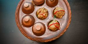 Haw mok (curried fish mousse cakes).