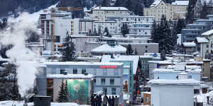 Security personnel stand on a rooftop for a briefing ahead of the World Economic Forum in Davos,Switzerland. Europeans are waiting to see if Donald Trump reprises his role as'Tariff Man'.