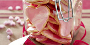 Heart-shaped iced biscuits.