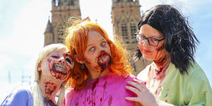 Halloween revellers dressed as zombies in Sydney.