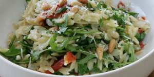 Orzo with rocket,tomato and pine nuts.