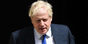 British Prime Minister Boris Johnson leaves 10 Downing Street to attend a questions and answers session in parliament on Wednesday.