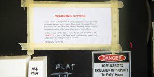 Lorraine Carvalho has placed her own Mr Fluffy warning notice in the electricity meter box at her home,informing visitors that there is no Mr Fluffy contamination in the living areas.
