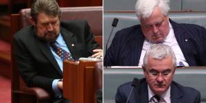 Australian politicians snapped dozing off in parliament:Left,Derryn Hinch in 2016,and right,Clive Palmer in 2014.