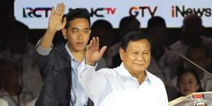 Presidential election frontrunner Prabowo Subianto (right) and his vice-presidential running mate Gibran Rakabuming Raka. Subianto was an army general under former president Suharto’s military-backed regime.