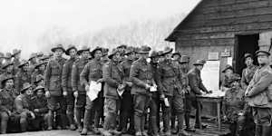 The soldiers'vote:men of the 44th Battalion cast their ballots;conscription referendum,Belgium,December 8,1917?