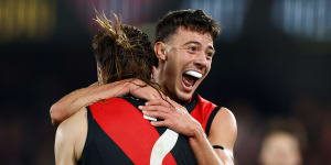 Massimo D’Ambrosio and Sam Draper (left) celebrate the matchwinning goal 