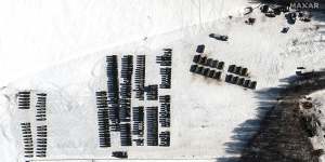 A satellite image shows troops and logistics material support units,near Yelsk,Belarus,at the weekend.