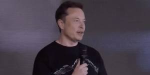 A screengrab from a live video on the 7News YouTube channel showing an AI-generated Elon Musk.