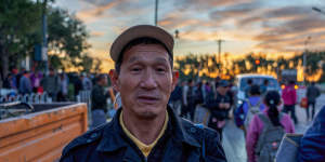 Xiao Zhiquan,59,waits by the road in eastern Beijing each day hoping to pick up work.