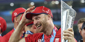 England captain Jos Buttler proudly holds the Twenty20 World Cup trophy.