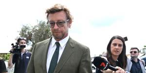 Actor Simon Baker leaves the Mullumbimby Court House in Mullumbimby,NSW,on Wednesday.