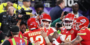 The Chiefs’ Mecole Hardman jnr and Patrick Mahomes celebrate the winning touchdown in overtime.