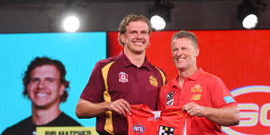 New Gold Coast coach Damien Hardwick (right) was pleased when his club landed hulking forward Jed Walter from its own academy at the draft.