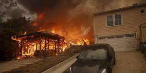 A home on fire in the Pacific Palisades neighbourhood of Los Angeles.