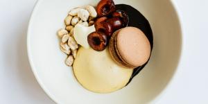 Peanut butter semifreddo,dark chocolate macaron and macerated cherries.