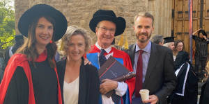 With children (from left) Anna,Alex and Daniel,in 2021,receiving an honorary degree of Doctor of Arts at the University of Adelaide.