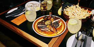 Oysters,fries and free-range chicken with burnt chilli nuoc mam at Firebird.