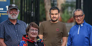 Era Court residents Ken and Andrea Eldridge,Pasha Memon and Andre Chin want Carey Grammar to keep the school bus service.