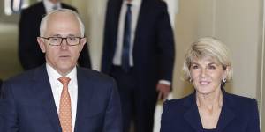Former prime minister Malcolm Turnbull and former foreign minister Julie Bishop exit the party room after the second Liberal leadership spill of 2018.