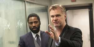 Christopher Nolan,right,directs John David Washington on the set of Tenet.