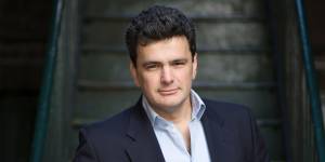 Former Xinja chief executive Eric Wilson has been disqualified from banking for eight years. 