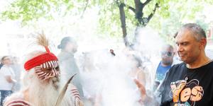 Uncle Moogy conducts a smoking ceremony to launch the Yes campaign for a Voice to parliament,