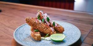 Crumbed fried lamb short ribs with honey,chilli,rosemary and hung buffalo milk yoghurt.