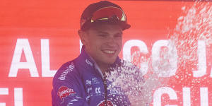 Jay Vine celebrates after winning the sixth stage of the Vuelta.