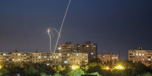 Russian rockets are launched against Ukraine from Russia’s Belgorod region,seen from Kharkiv,Ukraine,late on Sunday.