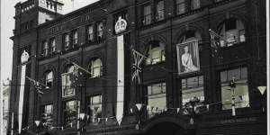The old Grace Brothers Broadway building in May 1937 when it was decorated for a Coronation festival.