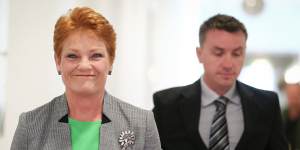 One Nation Senator Pauline Hanson with adviser James Ashby. Both have denied any wrongdoing.