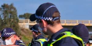 ADF personnel and Victoria Police at a checkpoint on the Princes Freeway on the outskirts of Melbourne.