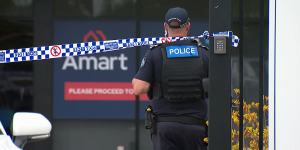 Police shoot man outside Brisbane furniture warehouse