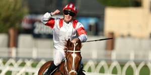 Reece Jones celebrates his win in The Metropolitan at Randwick on Saturday.