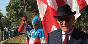 Roger Stone at a pro-Trump protest in Washington,DC,with"Captain America". 