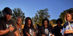 The family of George Floyd at a candlelight vigil marking the third anniversary of his murder.