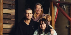 Rose Beaugeard – who pays 15 per cent of her salary to her parents while studying to be a doctor – with her mother,Linda,brother Damien and dog Bailey.