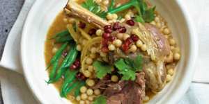 Lamb tagine with giant coucous and pomegranate jewels.
