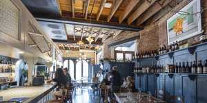 Patsy's blue-and-white room in a classic Melbourne art-deco building.