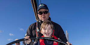 Students at Officer Specialist School. A sailing program to help transform the lives of students from low-socio-economic backgrounds and refugee backgroudns who are living with a disability. Student Dylan at the steering wheel. 
